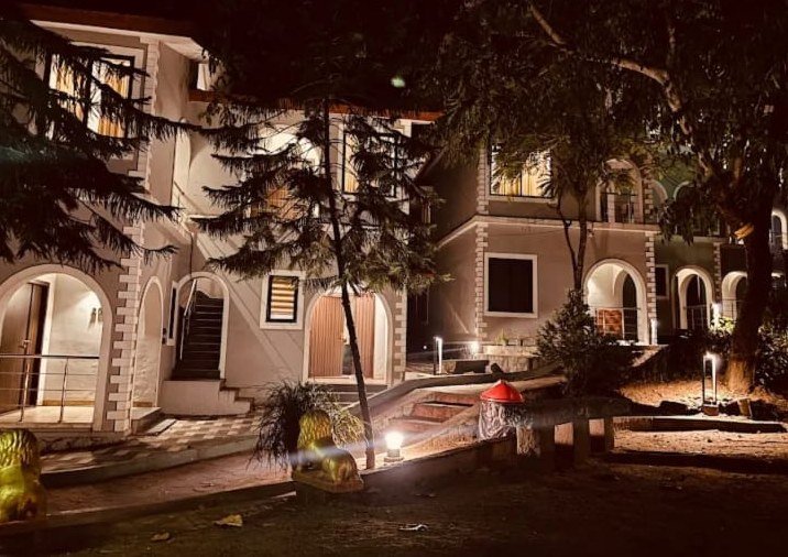 Resort building lit up at night